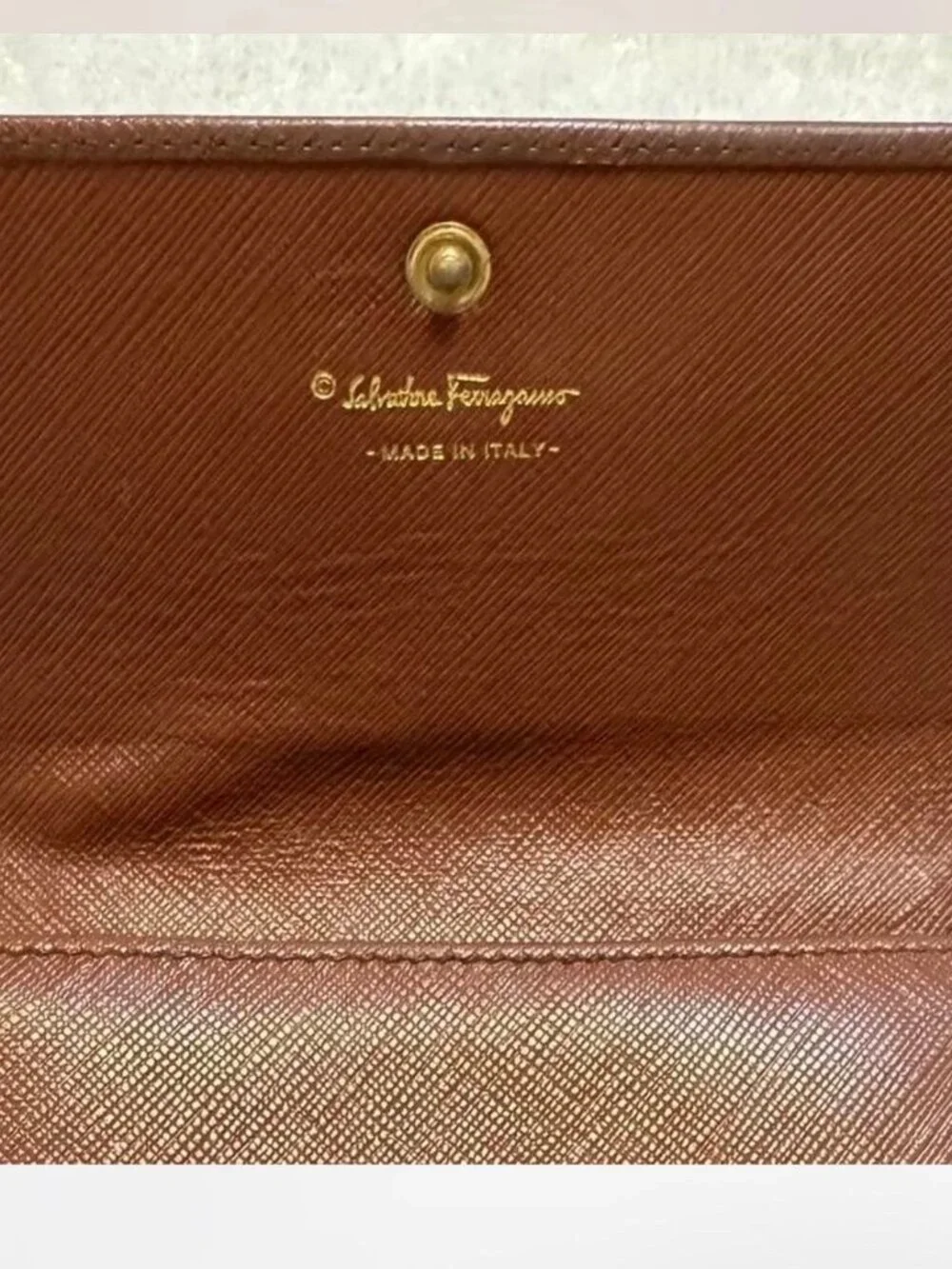 Salvatore Ferragamo Brown Leather Gancini Clutch with Gold Hardware